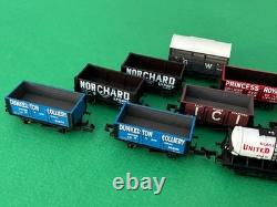 9 assorted Graham Farish Peco N gauge plank, mineral, coal, brake, tank wagons